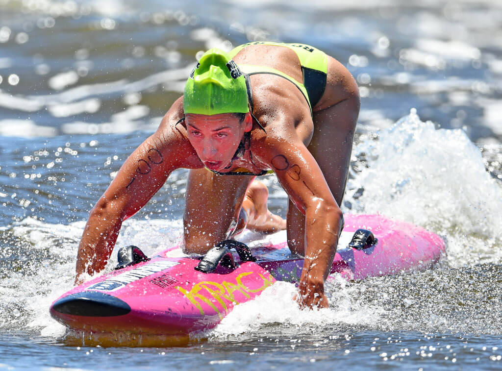 Lana Rogers racing a rescue board